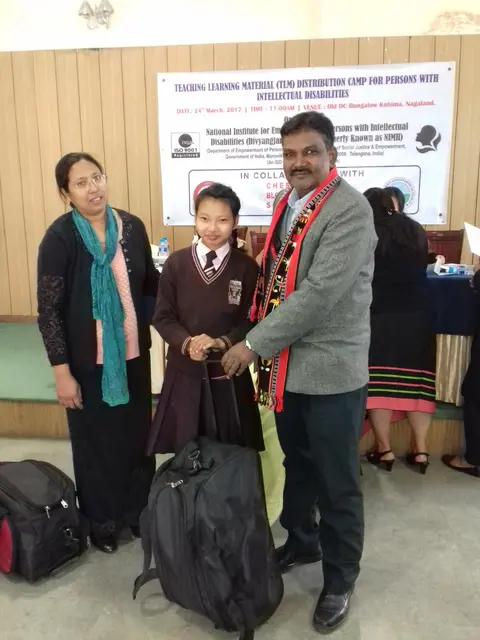 DC KOHIMA MR RAJESH SOUNARARAJAN  GIVING AWAY THE TLM
