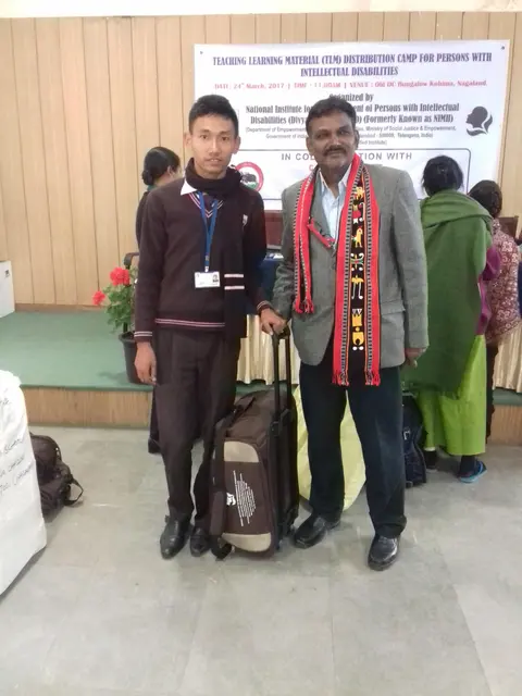  NIEPID OFFICIALS GIVING AWAY THE TLM