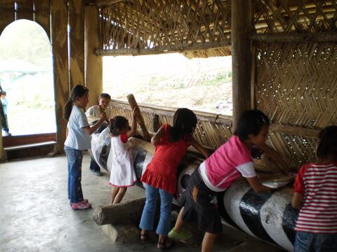TRYING THE LOG DRUM