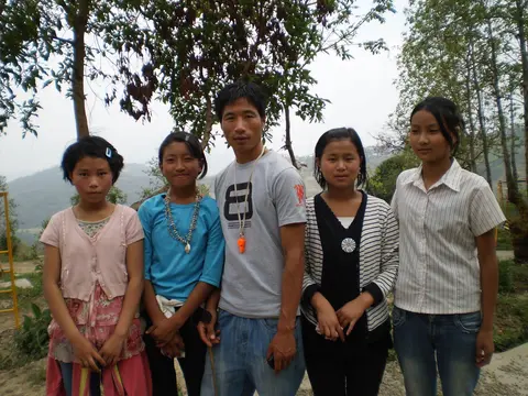 TEACHER WITH STUDENTS